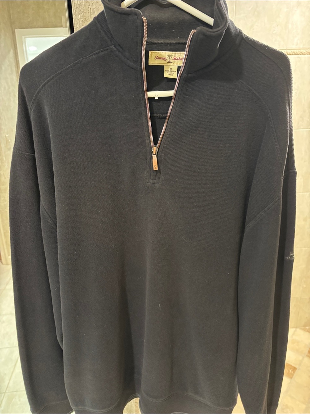Men’s Tommy Bahama black three-quarter zip sweater. S medium.